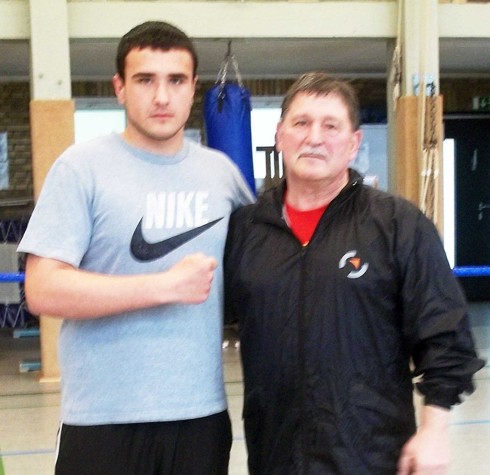 Boxer Ibrahim Sahin (l.) und sein stolzer Trainer Erich Weber.