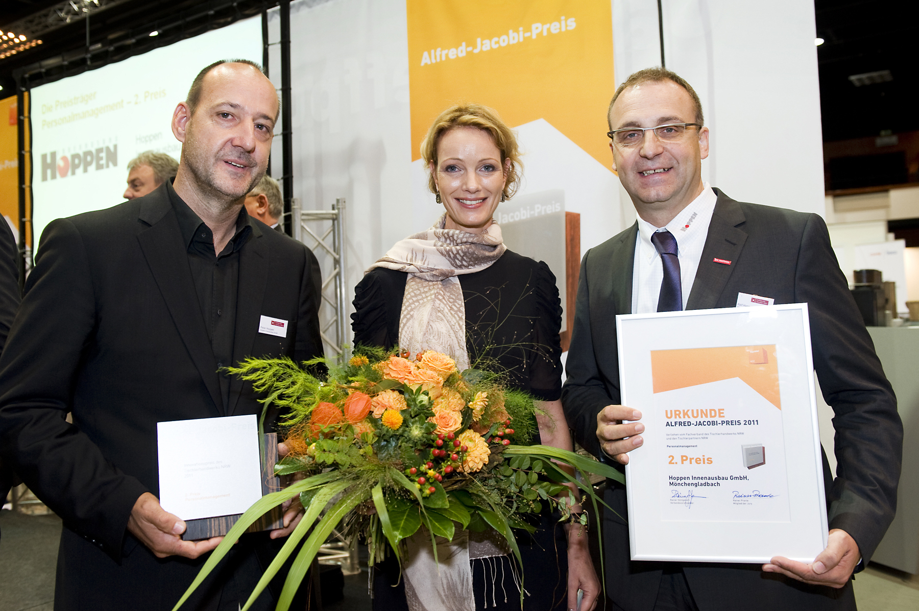 Peter, Katrin und Ralf Hoppen bei der Verleihung des Innovationspreises des Tischlerhandwerks 2011.