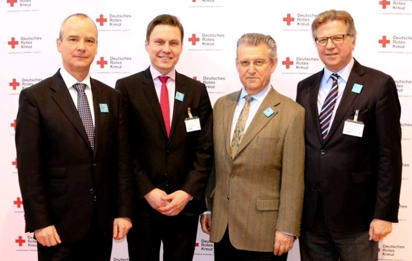 Detlef Nagel (stellvertretender Geschäftsführer von Westlotto), Dr. Hasan Sürgit (Vorstand DRK-Landesverband Westfalen-Lippe), Dr. Fritz Baur (Präsident DRK-Landesverband Westfalen-Lippe) und Ludger Jutkeit (Vorstandsvorsitzender DRK-Landesverband Westfalen-Lippe) beim 3. Freiwilligen und Ehrenamstag bei Westlotto in Münster (von links).