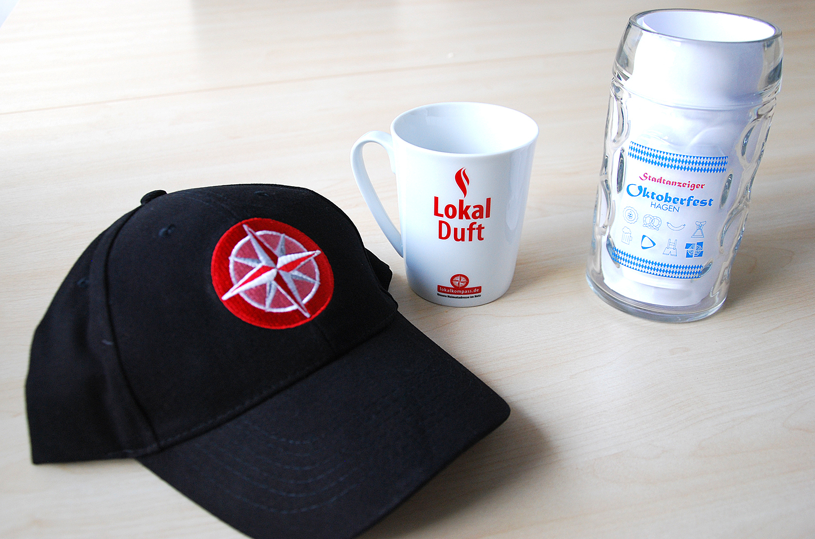 Lokalkompass-Kappen, Tassen und Stadtanzeiger-Bierseidel gibt es zu gewinnen.