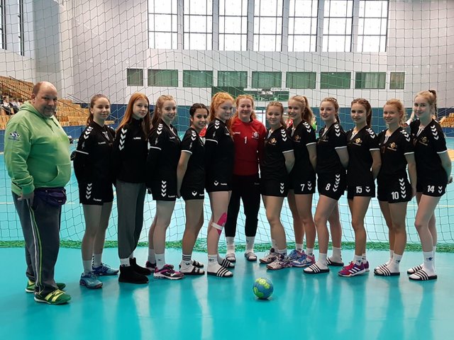 Erfolgreiche Mannschaft und Trainer