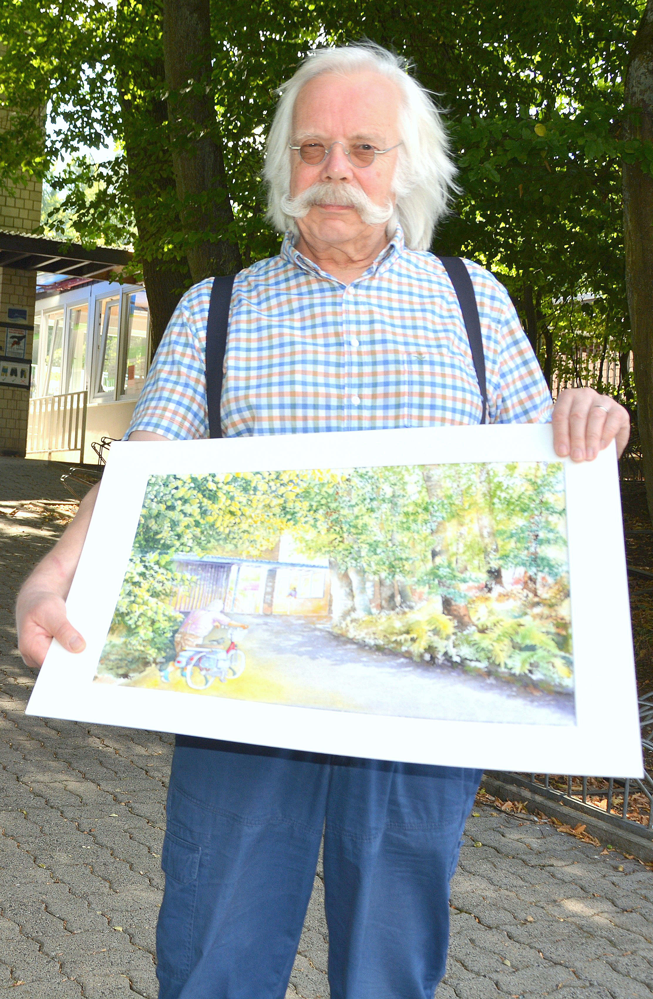 Hermann-Josef Schnell, hier mit einem seiner Werke, wird für seinen Einsatz gewürdigt. Foto: Archiv