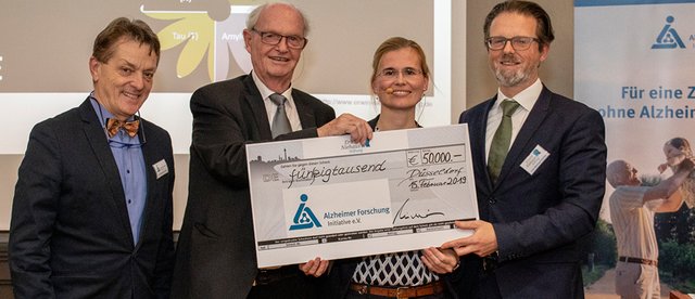 Preisträgerin Prof. Kathrin Reetz mit AFI-Vorstand Dr. Michael Lorrain, Stifter Erwin Niehaus und Vorstand Carl Michael Eichler (v.l.n.r.)