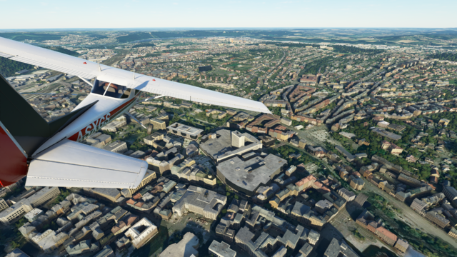 Die Hagener City mit den Shopping-Galerien, dem Ebert-Platz und am Horizont den Hengsteysee.