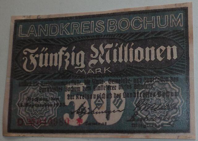 Foto: Textquelle Homepage Stiepeler Heimatverein. Copyright Fotos: Verkleinerungen Reichsmark und Beamervortrag von Andreas Finke.