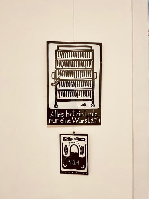 "Alles hat ein Ende - nur die Wurst hat zwei" - Scherenschnitt von Oksana Kuznetsova in der Ausstellung "EINTAUCHEN" in der Ruhr Gallery Mülheim | Foto: Mülheimer Kunstverein und Kunstförderverein KKRR
