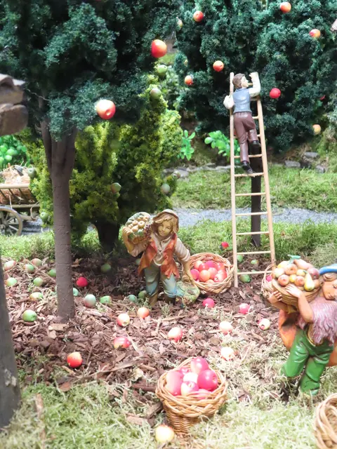 Die Obstpflücker im Apfelhof.